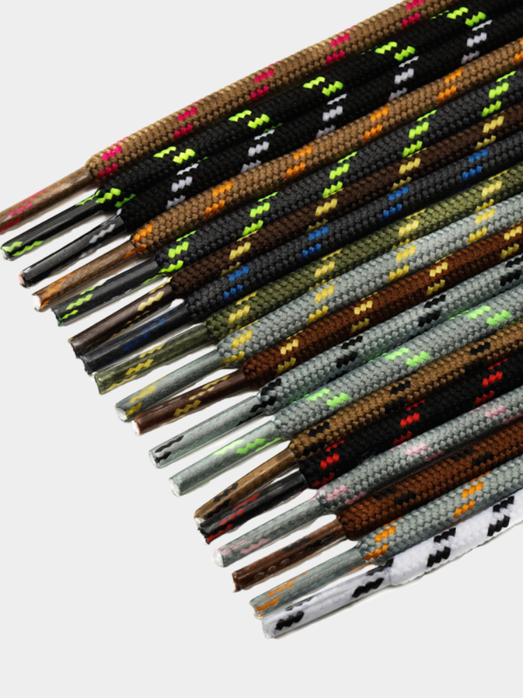 Army green Mercer Society laces shown, featuring durable cotton material and metal eyelets for shoes or sneakers.