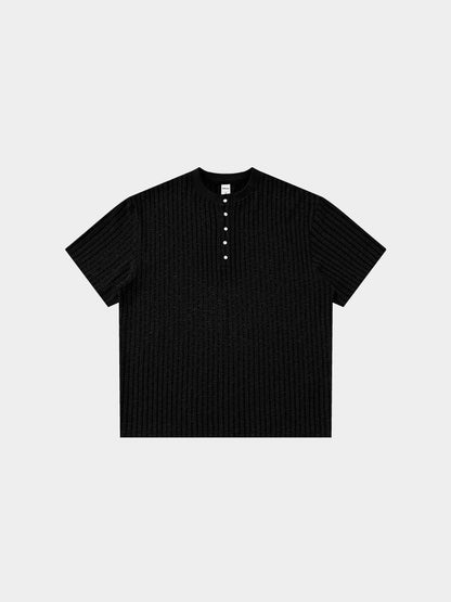 Black Mercer Society Rill Henley shirt displayed on a mannequin, featuring a classic henley collar and long sleeves.