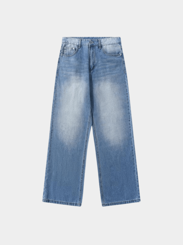 Mercer Society Tide Jeans displayed on a hanger, featuring classic blue denim with a straight-leg fit and subtle fading details.